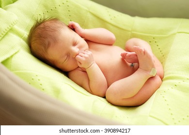 One Week Old Newborn Baby In Cocoon 