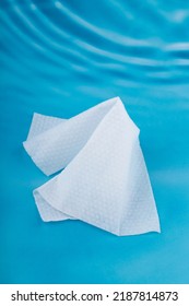 One wet wipe isolated on blue - Shutterstock ID 2187814873