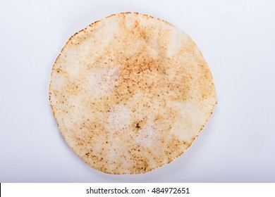 One Wheat Pita Bread Isolated On White.