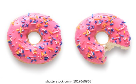 One whole and one with missing bite pink frosted donuts. Isolated on white background  - Powered by Shutterstock