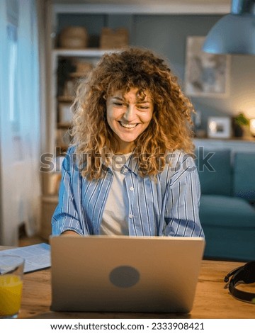 one woman adult caucasian work on her laptop at home happy smile