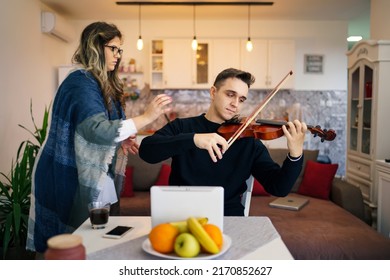 One Woman Caucasian Learning Man To Holding And Play Violin In His House At Home Mentoring Tutoring Study At Home Concept