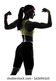 One Woman Exercising Fitness Flexing Muscles Rear View In Silhouette On White Background