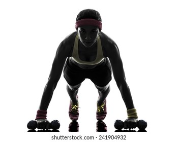 One Woman Exercising Fitness Workout Push Ups In Silhouette On White Background