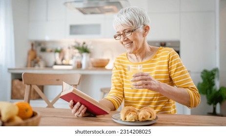 One woman mature senior caucasian female pensioner modern grandmother read book at home wear eyeglasses real person copy space - Powered by Shutterstock