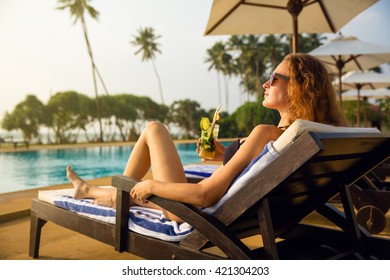 One Woman Near The Swimming Pool In Hotel With Cocktail