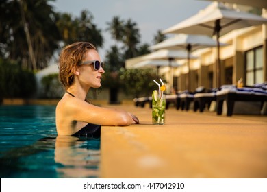 One Woman Near The Swimming Pool In Hotel With Cocktail