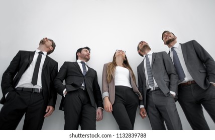 One Woman Three Men In Business Suits Standing In A Row