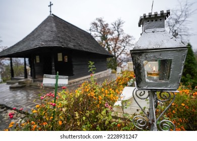 One wood church (Biserica dintr-un lemn in Romanian language) landmark in Valcea County from Romania during a cloudy autumn day. Monasteries of Romania.