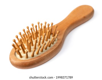 One Wooden Paddle Hairbrush Isolated On White