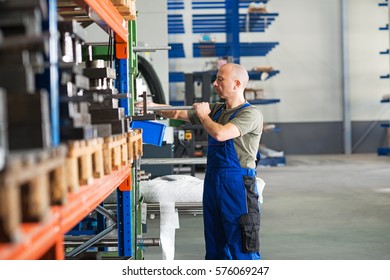 One Worker In Factory In Stockroom