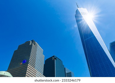 One Worl Trade Center with blue sky.