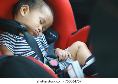 One Year Asian Baby Sleeping In Baby Car Seat