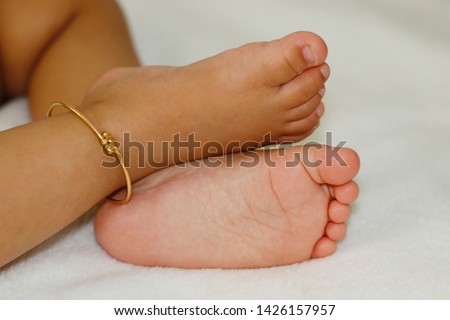 one year old baby boy's cute feet