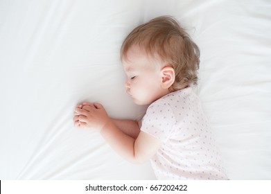 One Year Old Baby Girl Sleeping.