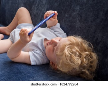 One Year Old Baby Watching Youtube Videos On A Mobile Phone