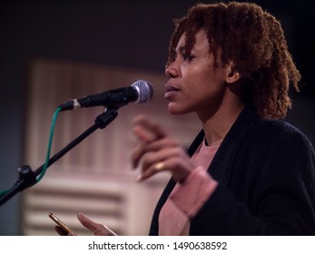 One Young African Singer Singing On The Stage Black Young Woman Giving Speech Close Up Side View Of One Young African Singer Singing On The Stage