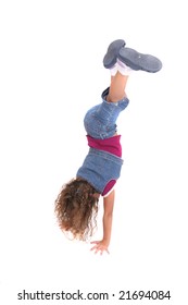 one young female child flipping over in a cartwheel over white