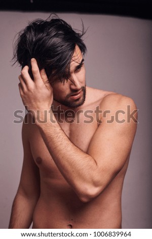 Similar – Image, Stock Photo young man shirtless studio shot portrait