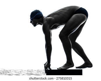 one young man swimmer swimming in silhouette on white background