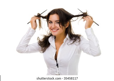 One Young Woman Twirl Her Hair With Sticks In White Shirt Smiling And Looking At Camera