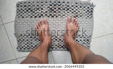one's feet step on cloth for feet