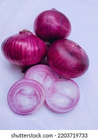 Onion bulb and pieces raw fresh organic redonion vegetable pieces for cooking or common onion shallot or allium cepa closeup view stock image photo 