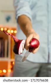 Onion Cut Unknown Caucasian Man Hand Holding Knife Cutting Levitating Onion Flying In The Air Food Cut Vegetables In Day Front View Close Up Midsection