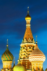 The Onion Domes Of St. Basil's Cathedral In Red Square Illuminated At Night, UNESCO World Heritage Site, Moscow, Russia, Europe