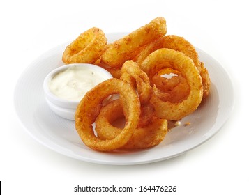 Onion Rings And Dip Sauce Isolated On White Plate