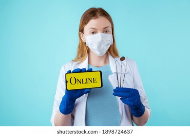 Online Appointment To Dentist From Your Phone. Female Doctor Holding Medical Instruments And Mobile Isolated Over The Blue Background.