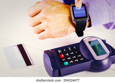 Online banking against man using smart watch to express pay - Powered by Shutterstock