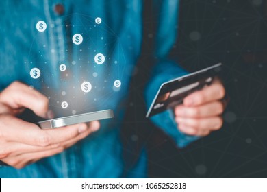 Online banking businessman using smartphone with credit card Fintech and Blockchain concept - Shutterstock ID 1065252818