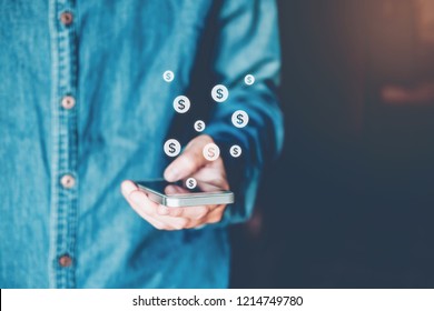 Online banking businessman using smartphone wit Fintech and Blockchain concept - Powered by Shutterstock