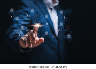 Online banking interbank payment concept. Businessman touching central bank and foreign currency on virtual screen for money transfers and currency exchanges between countries of the world.