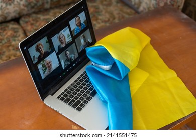 Online Behind A Laptop From Home Against The Background Of The Flag Of Ukraine, Martial Law In The Country, Online Broadcast Of Local News, Stop War And Patriot