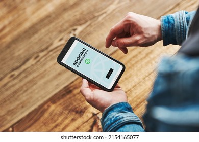 Online booking. Buying tickets and service online. Ordering service in online shop using smartphone. Order confirmation on screen. Person paying online using booking application on mobile phone - Shutterstock ID 2154165077