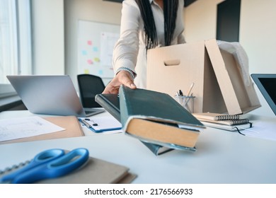 Online Bookstore Employee Preparing Secondhand Literature For Shipping