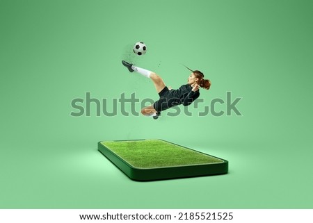 Online broadcasts of sports competitions. Young female soccer player playing football on screen of 3d model of phone over green background. Sport, achievements, media, betting, news, ad