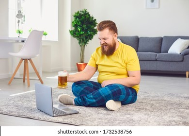 Online Conference Video Call Chat. Online Party With Friends. Funny Man Holds A Glass With Beer, Communicates With Friends Video Chat Call Online At Home.