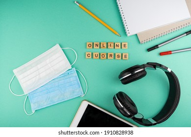 Online Course. The Phrase Is Laid Out In Wooden Letters. View From Above. Motivation. Copy Space.Tablet, Headphones Stationery. Distance Learning. Table Flatlay. Self-study. Medical Mask. 