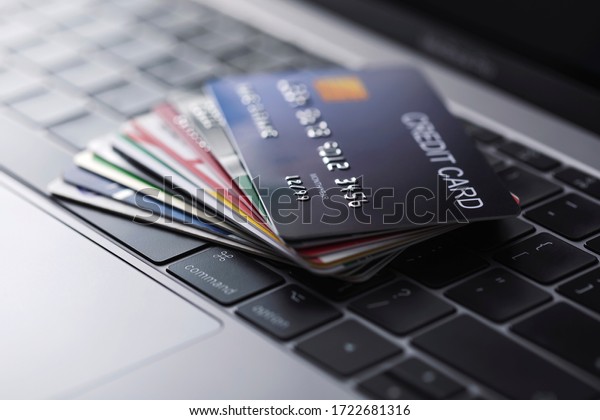 Online credit card\
payment for purchases from online stores and online shopping,\
Credit card close up shot.\
