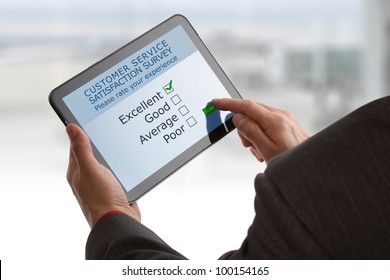 Online Customer Service Satisfaction Survey On A Digital Tablet