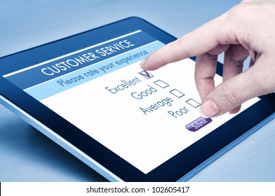 Online Customer Service Satisfaction Survey On A Digital Tablet