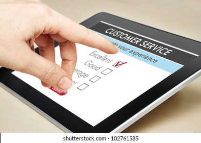 Online Customer Service Satisfaction Survey On A Digital Tablet