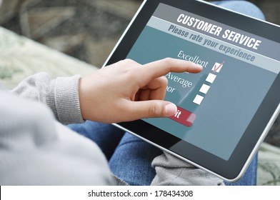 Online Customer Service Satisfaction Survey On A Digital Tablet