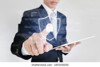 Online data security system and network cyber security technology. Businessman scan finger on screen to unlocking security system