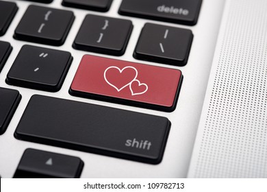 Online dating on computer keyboard