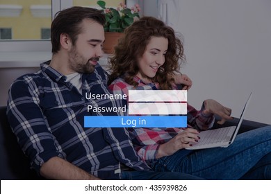 Online Dating Website Concept - Cheerful Young Couple Using Laptop At Home