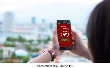 Online Dating,scam Concept.Female Hands Using Smart Phone